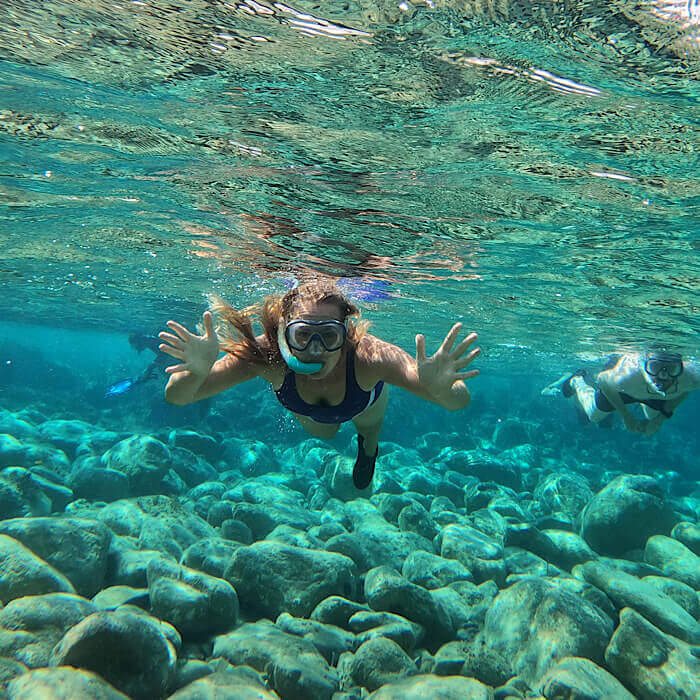 Sardinia slow experience hike and snorkel capo comino 2022 excursion tour sea redisland swimming